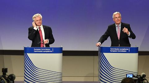 Brexit Minister David Davis and European Commission member in charge of Brexit negotiations Michel Barnier address a press conference in Brussels on June 19, 2017 (EMMANUEL DUNAND/AFP/Getty Images)