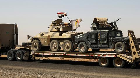 Armored vehicles belonging to Iraqi Popular Mobilization Units near Tal Afar, August 31, 2017 (AHMAD AL-RUBAYE/AFP/Getty Images)