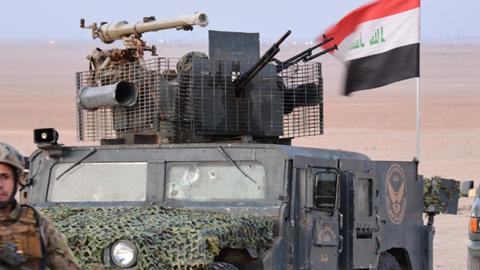 Iraqi rapid intervention forces advance as they take part in an operation against Islamic State (IS) group jihadists east of Tuz Khurmatu, February 7, 2018 (MAHMUD SALEH/AFP/Getty Images)