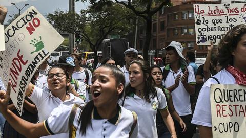 Students, teachers and social activists hold a demonstration demanding improvements in education, higher wages and better infrastructure in Medellin, Colombia, February 21, 2018 