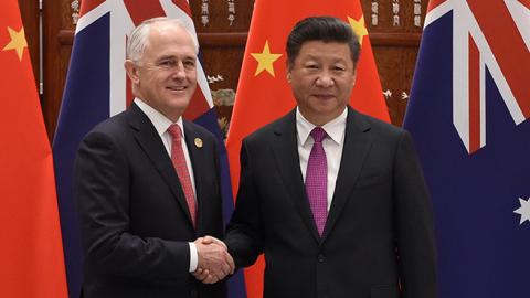 HANGZHOU, CHINA - SEPTEMBER 4: Australia's Prime Minister Malcolm Turnbull (L) shakes hands with Chinese President Xi Jinping (R) at the West Lake State Guest House on September 4, 2016 in Hangzhou, China. The 11th G20 Leaders Summit will be held from Sep