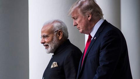 President Donald Trump walks to a joint statement in the Rose Garden with Indian Prime Minister Narendra Modi at the White House in Washington, DC.