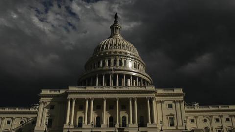 Dark clouds roll past the U.S. Capitol in Washington, D.C. (Getty Images)