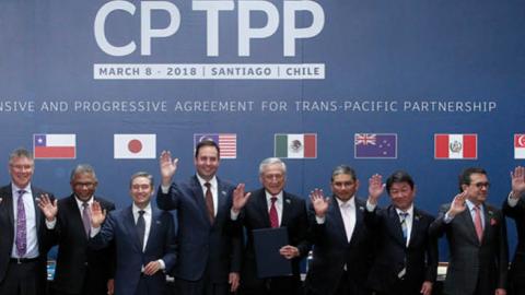 Official picture after signing the rebranded 11-nation Pacific trade pact Comprehensive and Progressive Agreement for Trans-Pacific Partnership (CPTPP) in Santiago, on March 8, 2018. (Getty Images)