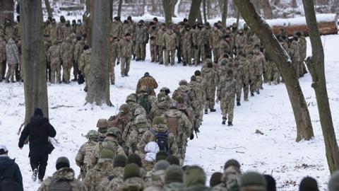 Civilian participants in a Kyiv Territorial Defense unit train on a Saturday in a forest on January 22, 2022, in Kyiv, Ukraine.  (Getty Images)