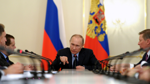 Russia's President Vladimir Putin (C) chairs a government meeting in his Novo-Ogaryovo residence, outside Moscow on March 5, 2014 (ALEXEY DRUZHININ/AFP/Getty Images)