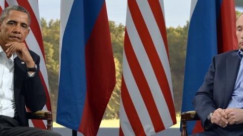 US President Barack Obama (L) holds a bilateral meeting with Russian President Vladimir Putin during the G8 summit at the Lough Erne resort near Enniskillen in Northern Ireland, on June 17, 2013. (JEWEL SAMAD/AFP/Getty Images)