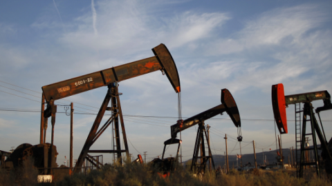 Pump jacks and wells are seen in an oil field on the Monterey Shale formation, March 23, 2014 near McKittrick, California(David McNew/Getty Images)