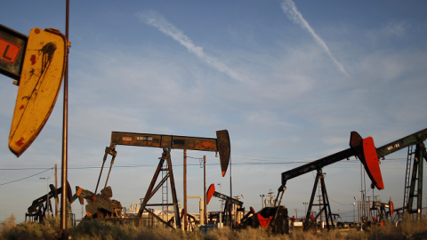 Pump jacks and wells in an oil field on the Monterey Shale formation, March 23, 2014 near McKittrick, California (David McNew/Getty Images)