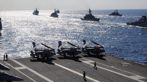 US and Japanese warships follow US aircraft carrier USS George Washington during a US-Japan military exercise at the Pacific Ocean on December 10, 2010. (TOSHIFUMI KITAMURA/AFP/Getty Images)