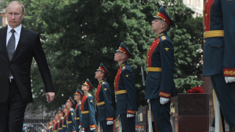 Russia's President Vladimir Putin at the Tomb of the Unknown Soldier just outside the Kremlin in Moscow on June 22, 2012 (ALEXEY DRUZHININ/AFP/GettyImages)