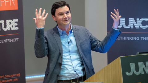French economist Thomas Piketty speaks to students and guests during a presentation at King's College, central London, on April 30, 2014. (LEON NEAL/AFP/Getty Images)