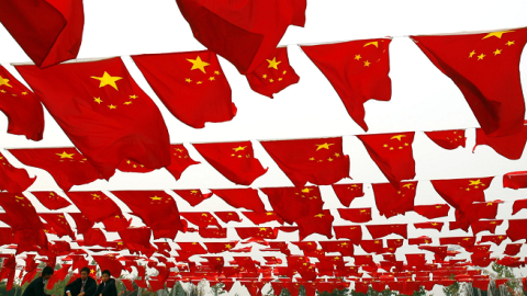 A national flag show at Chaoyang park in Beijing, China, September 30, 2006 (China Photos/Getty Images)