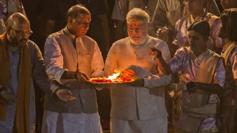 BJP leader Narendra Modi, (C), performs the Hindu Ganga Puja prayer ritual the day after his election victory on May 17, 2014 in Varanasi, India. (Kevin Frayer/Getty Images)