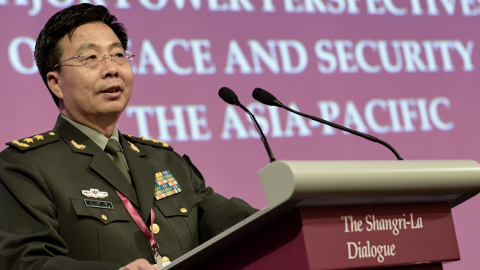 Deputy Chief of the General Staff of the People's Liberation Army Wang Guanzhong speaks at the 13th International Institute for Strategic Studies Shangri-La Dialogue in Singapore on June 1, 2014. (ROSLAN RAHMAN/AFP/Getty Images)