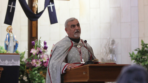 Iraqi priest Monsignor Pios Cacha celebrating a mass at the Mar Yussef Church in central Baghdad, February 22, 2013. (AHMAD AL-RUBAYE/AFP/Getty Images)