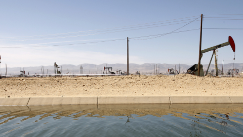 Pump jacks in an oil field over the Monterey Shale formation on March 23, 2014 near Lost Hills, California. (David McNew/Getty Images)