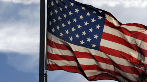 A US flag flutters at The Lafayette Escadrille Memorial of Marnes-la-Coquette, east of Paris, on November 11, 2013. (THOMAS SAMSON/AFP/Getty Images)