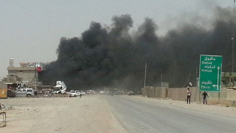 Bombed police checkpoint, Tuz Khurmatu, Iraq, June 9, 2014 (Marwan Ibrahim/AFP/Getty Images).