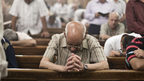 Egyptian Coptic Christians at the Virgin Mary church on May 16, 2014 in Cairo's Road al-Farag district. (VIRGINIE NGUYEN HOANG/AFP/Getty Images)