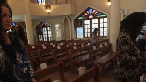 Iraqi Christians attend Sunday mass at the Virgin Mary Chaldean church in the Karrada neighborhood of the capital Baghdad on July 27, 2014. (AHMAD AL-RUBAYE/AFP/Getty Images)