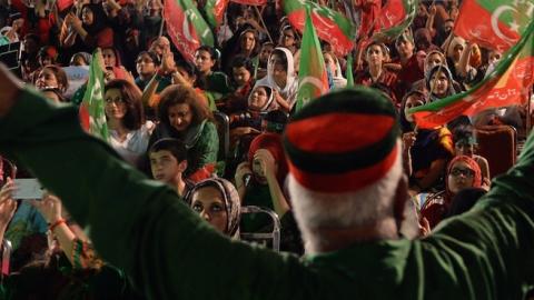 Pakistani supporters of opposition politician Imran Khan listen to his speech during an anti-government protest in front of the Parliament in Islamabad on August 24, 2014. (AAMIR QURESHI/AFP/Getty Images)