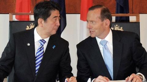 Japanese Prime Minister Shinzo Abe (L) and Australian Prime Minister Tony Abbott (R) at Parliament House in Canberra on July 8, 2014. (MARK GRAHAM/AFP/Getty Images)