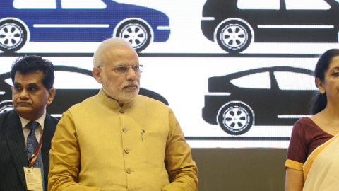 Indian Prime Miniser Narendra Modi (C) launches the "Make In India" project as Minister for Commerce and Industry Nirmala Sitaraman looks on in New Delhi on September 25, 2014. (RAVEENDRAN/AFP/Getty Images)