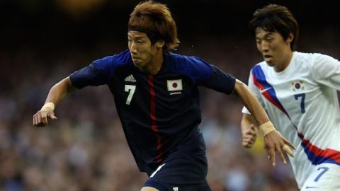 Yuki Otsu of Japan goes past Bokyung Kim of Korea during the Men's Football Bronze medal play-off of the London 2012 Olympic Games on August 10, 2012. (Julian Finney/Getty Images)