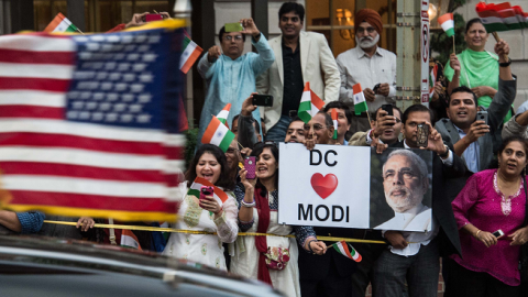 Wellwishers greet Indian Prrime Minister Narendra Modi as he arrives at the Indian embassy in Washington on September 30, 2014. (NICHOLAS KAMM/AFP/Getty Images)