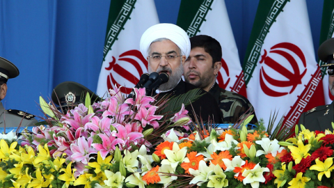 Iranian President Hassan Rowhani (C) delivers a speech as part of the annual Army Day military parade on April 18, 2014 in Tehran. (ATTA KENARE/AFP/Getty Images)