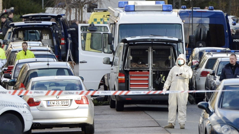 Policemen survey the area where a man tried to shoot Lars Hedegaard, February 5, 2013 in Copenhagen. (CLAUS BECH/AFP/Getty Images)