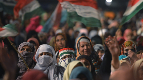 Supporters of Canadian-Pakistani cleric Tahir ul Qadri, listen to his speech during an anti-government protest in front of the Parliament in Islamabad on October 21, 2014.  ( AAMIR QURESHI/AFP/Getty Images)
