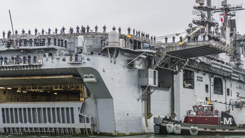 The amphibious assault ship Kearsarge returns to Naval Station Norfolk, Va., in November 2013 after an eight-month deployment.  (MCSN Edward Guttierrez III / Navy)