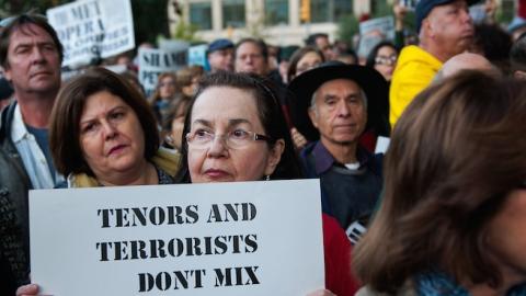 A protestor holds a sign outside the Metropolitan Opera at Lincoln Center on opening night of the opera, 'The Death of Klinghoffer' on October 20, 2014 in New York City. (Bryan Thomas/Getty Images)