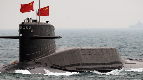 A Chinese Navy submarine attends an international fleet review to celebrate the 60th anniversary of the founding of the People's Liberation Army Navy on April 23, 2009 off Qingdao in Shandong Province. (Guang Niu/AFP/Getty Images)