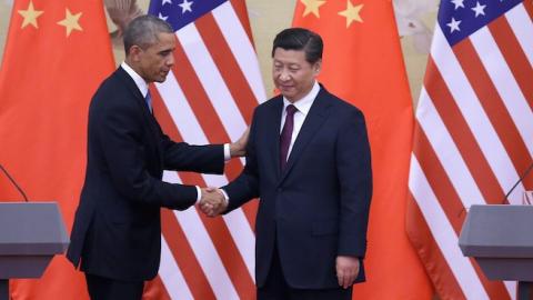 U.S. President Barack Obama (L) shakes hands with Chinese President Xi Jinping (R) after a joint press conference at the Great Hall of People on November 12, 2014 in Beijing, China. (Feng Li/Getty Images)