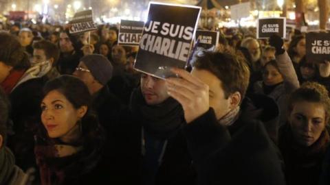 People hold placards reading in French 'I am Charlie' during a gathering on the Place de Republique in Paris, on January 8, 2015. (KENZO TRIBOUILLARD/AFP/Getty Images)