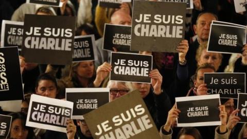 People hold signs reading 'I am Charlie' during a rally in Monaco on January 8, 2015, a day after a deadly attack on the Paris headquarters of French satirical weekly Charlie Hebdo. (VALERY HACHE/AFP/Getty Images)