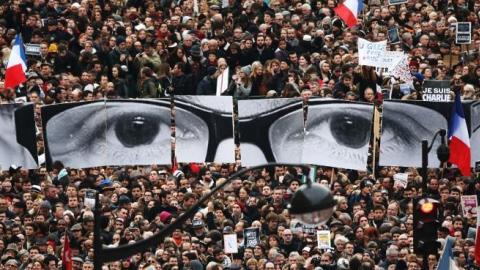 Demonstrators make their way along Boulevrd Voltaire in a unity rally in Paris following the recent terrorist attacks on January 11, 2015 in Paris, France. (Christopher Furlong/Getty Images)