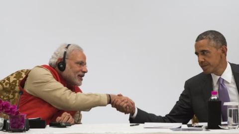 Indian Prime Minister Narendra Modi and US President Barack Obama shake hands during the India-US Business Summit in New Delhi on January 26, 2015. (SAUL LOEB/AFP/Getty Images)