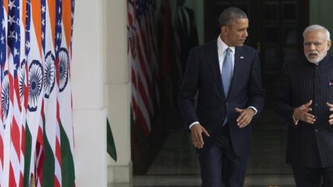 Indian Prime Minister Narendra Modi (R) and US President Barack Obama walk prior to meetings at Hyderabad House in New Delhi, India, January 25, 2015. (SAUL LOEB/AFP/Getty Images)