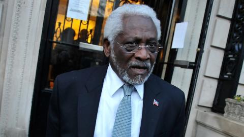 Raymond Joseph stands outside the Haitian embassy in Washington, DC, on January 19, 2010, following a candle light vigil one week after a massive earthquake destroyed Port-au-Prince. (Alex Ogle/AFP/Getty Images)