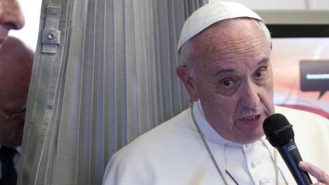 Pope Francis speaks to the press aboard a plane during his trip to the Philippines on January 15, 2015. (ALESSANDRA TARANTINO/AFP/Getty Images)