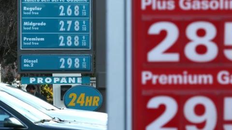 Drivers pass by gas prices that are displayed at Valero and 76 gas stations on February 9, 2015 in San Rafael, California. (Justin Sullivan/Getty Images)