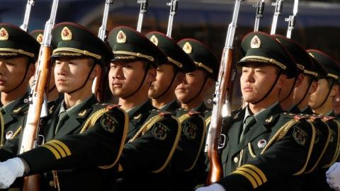 Members of the Chinese Army honor guard march at an arrival ceremony at Bayi Building January 10, 2011 in Beijing, China. (Larry Downing-Pool/Getty Images)