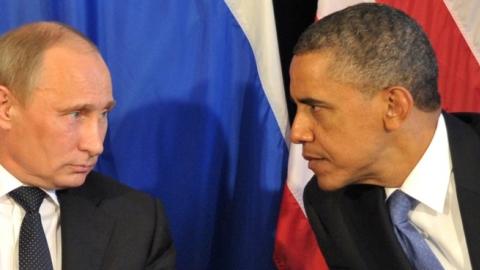 US President Barack Obama (R) meets his Russian counterpart Vladimir Putin (L) in Los Cabos, Mexico, on June 18, 2012, during the G20 leaders Summit. (ALEXEI NIKOLSKY/AFP/GettyImages)