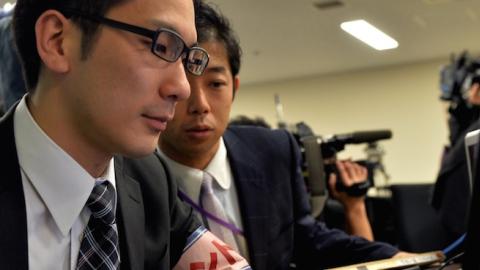 Government officers use their computers during a cyber security drill in Tokyo on March 18, 2014. (YOSHIKAZU TSUNO/AFP/Getty Images)