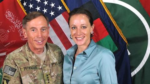 CIA Director Gen. Davis Petraeus shakes hands with biographer Paula Broadwell on July 13, 2011. (ISAF via Getty Images)