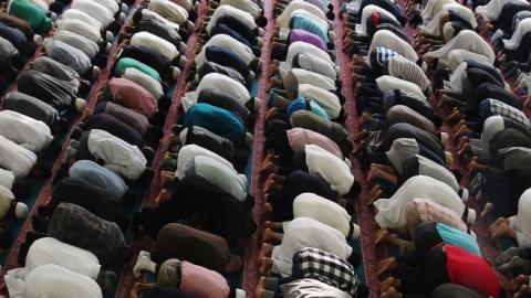 Muslim men pray at the East London Mosque on the last day of Ramadan on August 7, 2013 in London, England. (Dan Kitwood/Getty Images)
